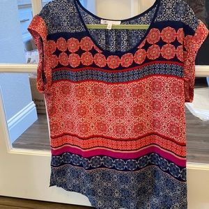 Capped sleeve blouse size L